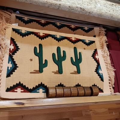 8 PLACEMATS, 8 LINEN NAPKINS ON THE FAR RIGHT, 6 NAPKINS ON THE OTHER TWO