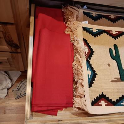 8 PLACEMATS, 8 LINEN NAPKINS ON THE FAR RIGHT, 6 NAPKINS ON THE OTHER TWO