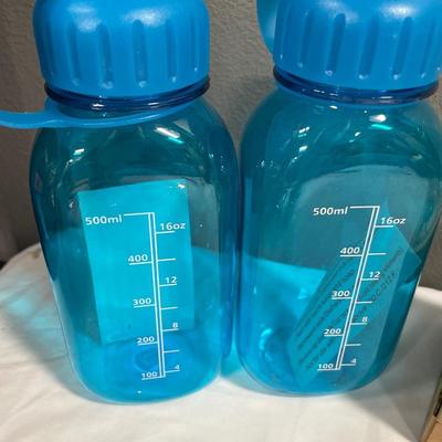 2 water bottles and collectors car