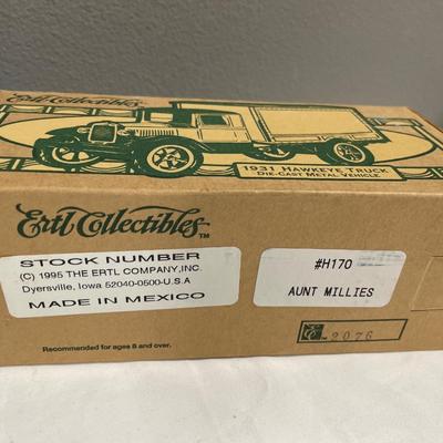 2 water bottles and collectors car