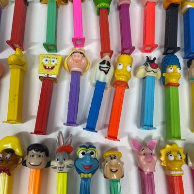 (32) PEZ DISPENSERS various characters & themes - Disney, Star Wars, Warner Bros., etc