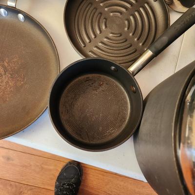 Table Full of Circulon Pots, Pans Grill