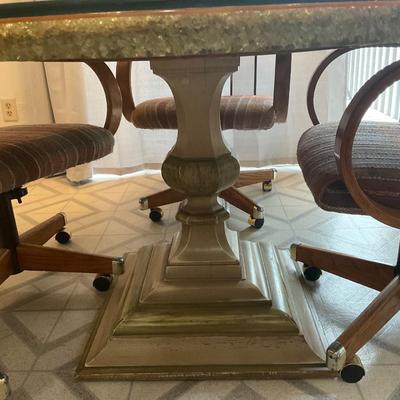 K1-stone top table with four rolling chairs
