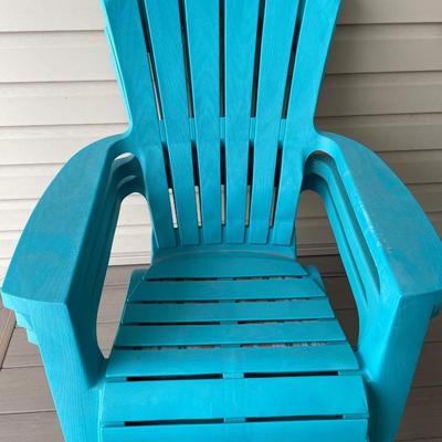 3 teal Adirondack chairs