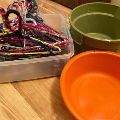 Wrapped hangers and wash buckers
