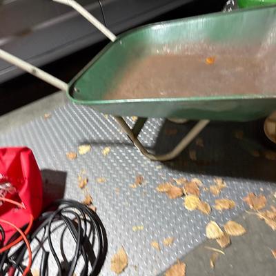 Vintage green wheel barrel