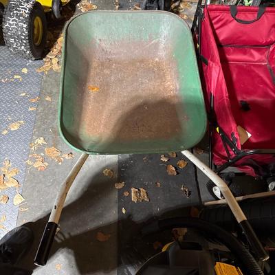 Vintage green wheel barrel