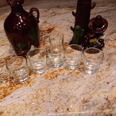 2 EMPTY LIQUOR DECANTERS AND SHOT GLASSES