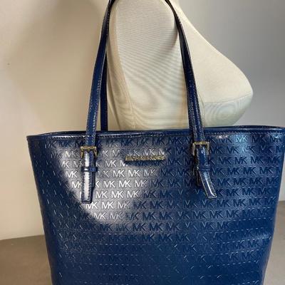 Sale Photo Thumbnail #83: NWOT MK embossed tote. Excellent new condition!