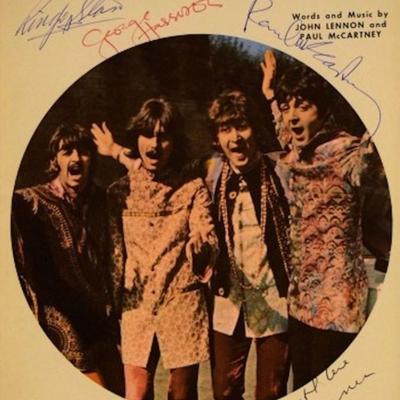 The Beatles signed music book