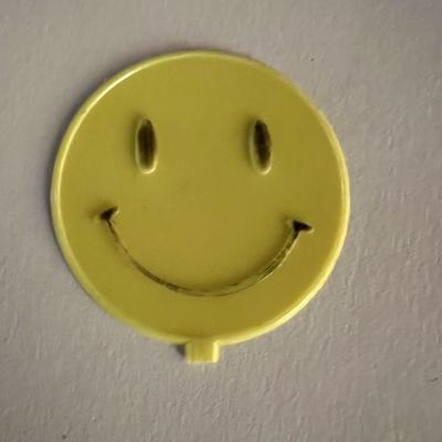 Happy face disc