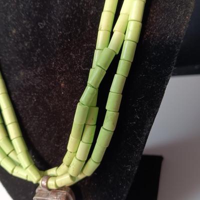 GASPEITE? MULTI STRAND NECKLACE WITH STERLING CLASP AND PENDANT