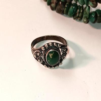 TURQUOISE BEADED BRACELET AND A STERLING SILVER WITH TURQUOISE STONE RING