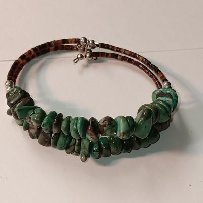 TURQUOISE BEADED BRACELET AND A STERLING SILVER WITH TURQUOISE STONE RING