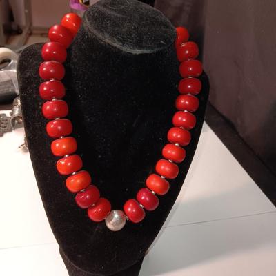 RED BEADED NECKLACE AND 3 PAIRS OF EARRINGS