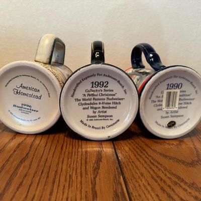VARIOUS BUDWEISER STEINS