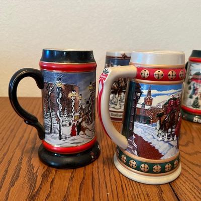 ARRAY OF BUDWEISER STEINS