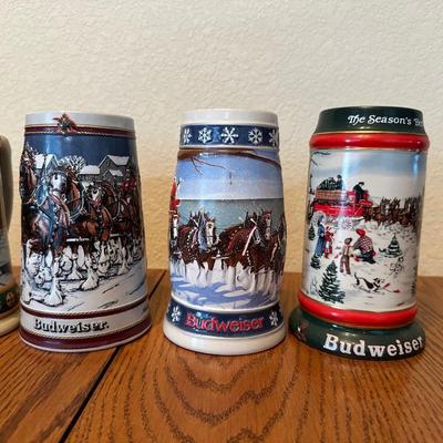 ARRAY OF BUDWEISER STEINS