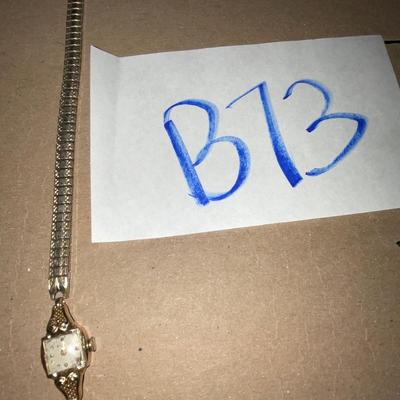 B73-Bulova (broken) stamped 14K