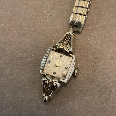 B73-Bulova (broken) stamped 14K