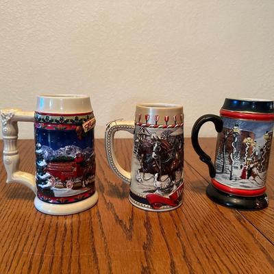 ASSORTMENT OF BUDWEISER STEINS