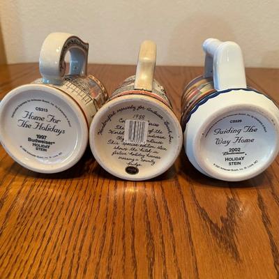 VARIOUS BUDWEISER STEINS