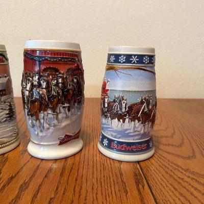 ARRAY OF BUDWEISER STEINS