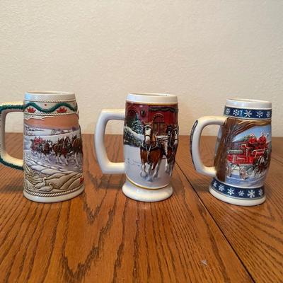 ARRAY OF BUDWEISER STEINS