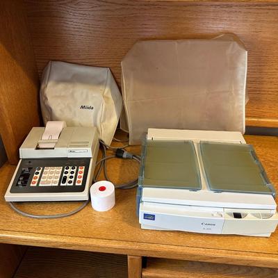 MIIDA ELECTRONIC PRINTING CALCULATOR AND CANON COMPACT PORTABLE LASER COPIER