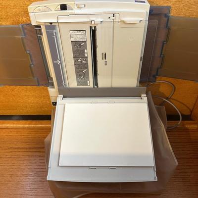 MIIDA ELECTRONIC PRINTING CALCULATOR AND CANON COMPACT PORTABLE LASER COPIER