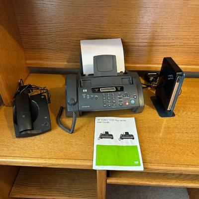 HP FAX MACHINE, GE CORDLESS HOME PHONE AND NETGEAR ROUTER