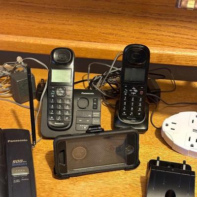 DESK LAMP, CORDLESS PHONES, SURGE BOX AND POWER CORDS PLUS MORE