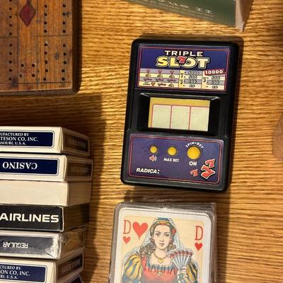 MANY DECKS OF CARDS, BACKGAMMON AND HANDHELD SLOT GAMES