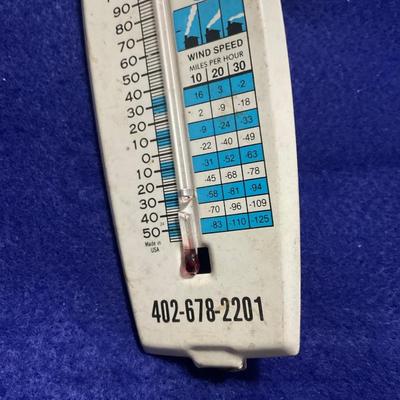 Advertisement Thermometer and Tape Measure
