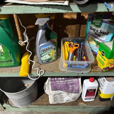 Green steel shelving unit with miscellaneous