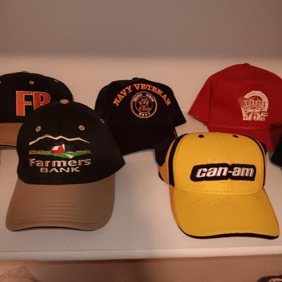 AN ASSORTMENT OF BALL CAPS