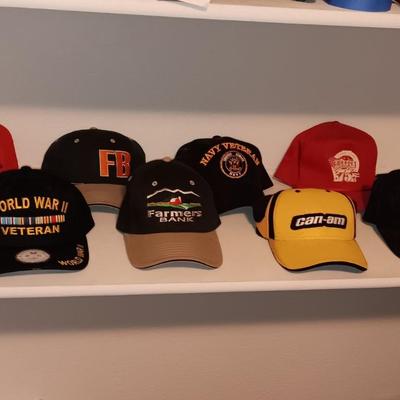 AN ASSORTMENT OF BALL CAPS