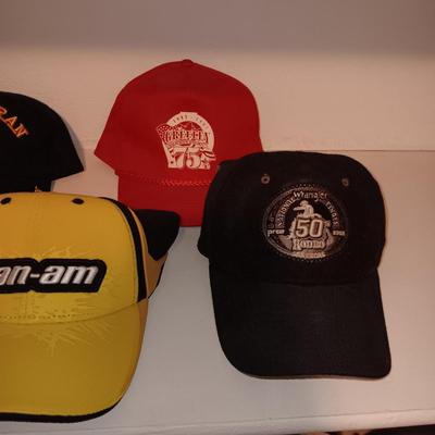 AN ASSORTMENT OF BALL CAPS