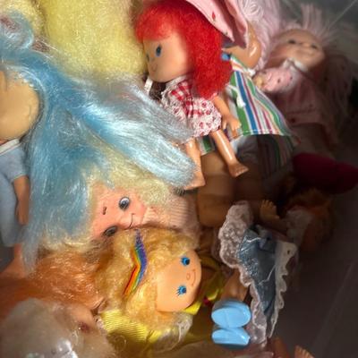 Lot 14 vintage dolls and 1 outfit