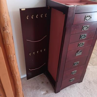 JEWELRY ARMOIRE W/8 DRAWERS, SIDE DOORS FOR NECKLACES AND LIFT UP TOP W/MIRROR