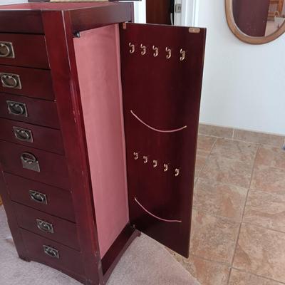 JEWELRY ARMOIRE W/8 DRAWERS, SIDE DOORS FOR NECKLACES AND LIFT UP TOP W/MIRROR