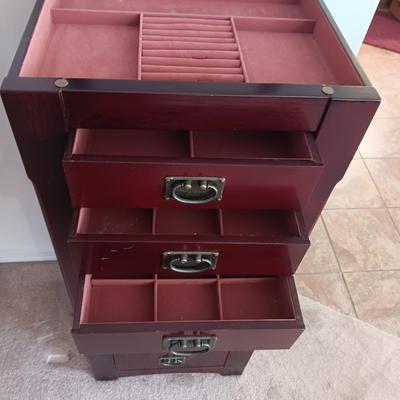JEWELRY ARMOIRE W/8 DRAWERS, SIDE DOORS FOR NECKLACES AND LIFT UP TOP W/MIRROR