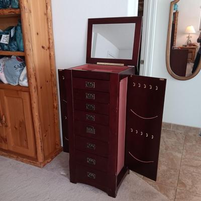 JEWELRY ARMOIRE W/8 DRAWERS, SIDE DOORS FOR NECKLACES AND LIFT UP TOP W/MIRROR