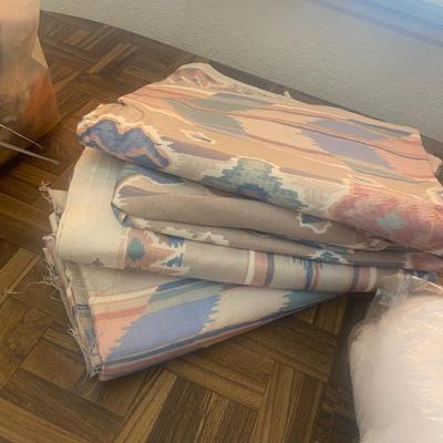 SEVERAL YARDS OF MATERIAL & CUT FOR QUILTING AND OTHER LARGE PIECES OF MATERIAL