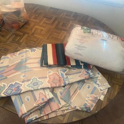 SEVERAL YARDS OF MATERIAL & CUT FOR QUILTING AND OTHER LARGE PIECES OF MATERIAL
