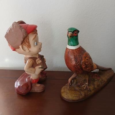 Hunting boy and Pheasent ceramic statues
