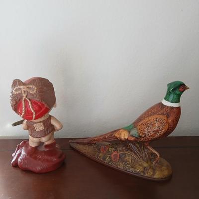 Hunting boy and Pheasent ceramic statues