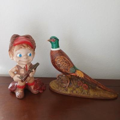 Hunting boy and Pheasent ceramic statues