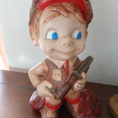 Hunting boy and Pheasent ceramic statues