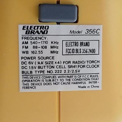 Motorola walkie talkies with charging station and an Electro Barand Multi use flashlight / radio